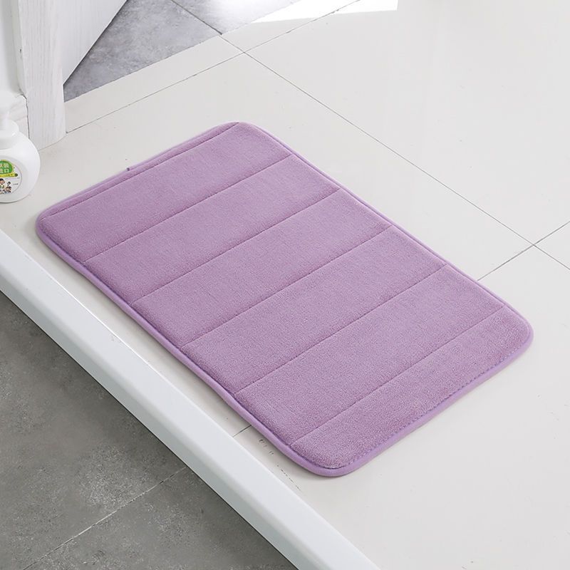 Absorbent bathroom mat