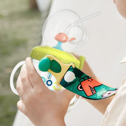 Baby drinking cup with fun whale splash design