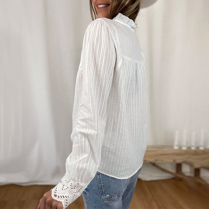 Elegant long-sleeved blouse with lace