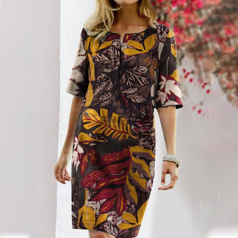 Elegant vintage dress with floral print and half sleeves