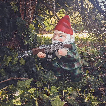 Garden gnome in camouflage with ak47