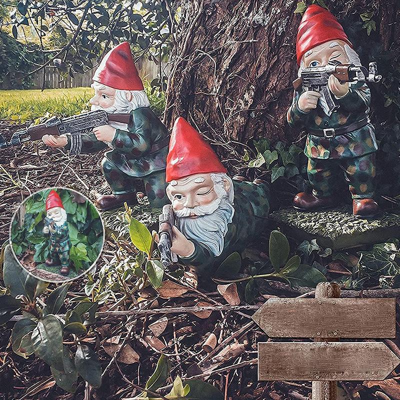 Garden gnome in camouflage with ak47