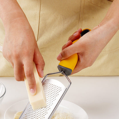 Handheld grater in stainless steel