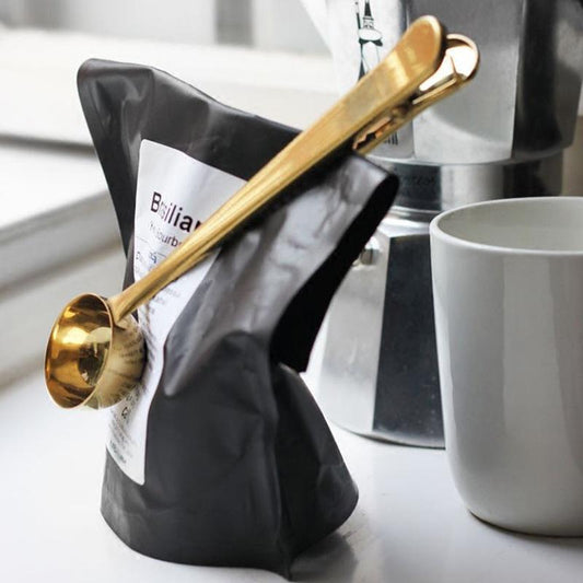 Decorative coffee spoon with clip