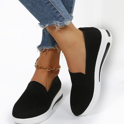 Wedge sneakers with flat heel and mesh surface