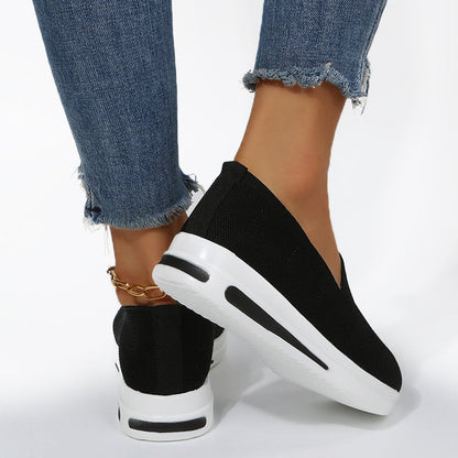 Wedge sneakers with flat heel and mesh surface