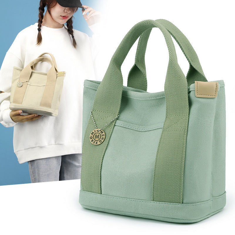 Canvas handbag with large capacity - woman