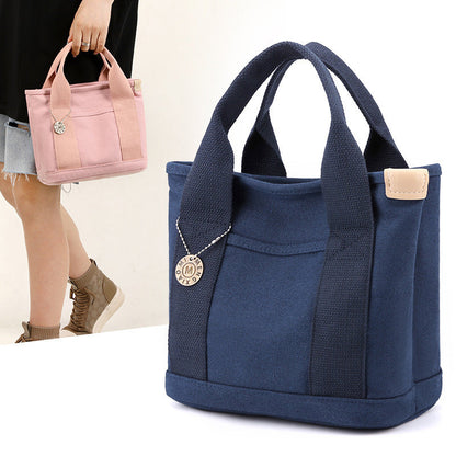 Canvas handbag with large capacity - woman