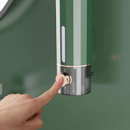 Manual soap dispenser for wall mounting