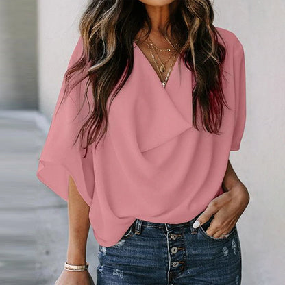 Pattern-free blouse with flared sleeves